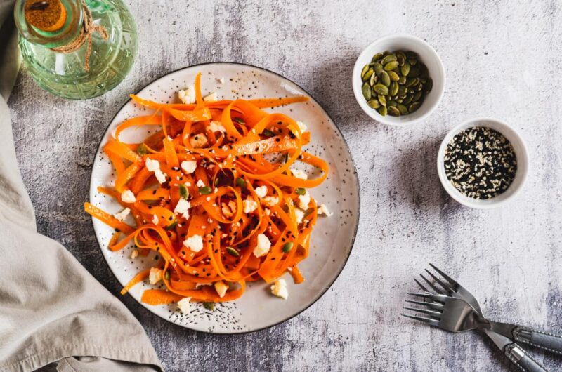 Carrot salad with honey, seeds and feta