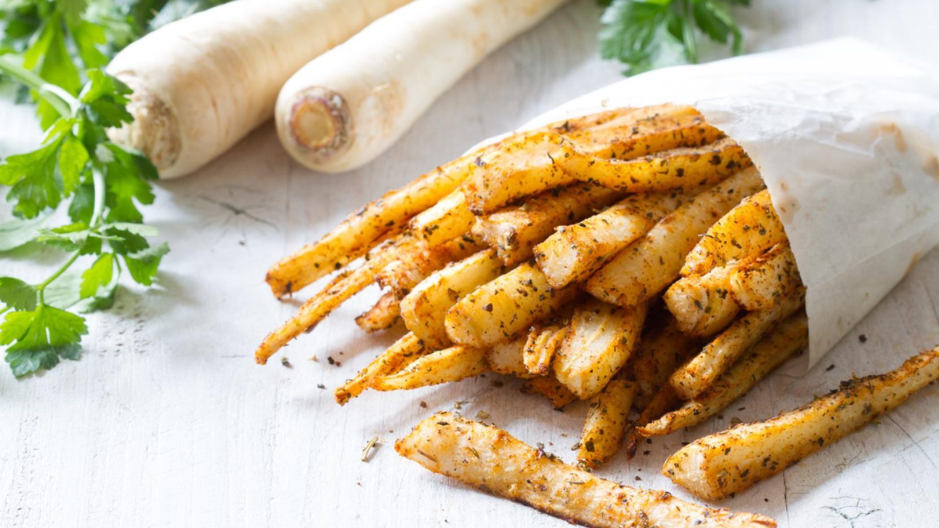 Crispy air fryer parsnip dipping sticks served with beetroot hummus